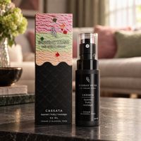 Cassata Ice Cream Spray bottle and box together on a console table