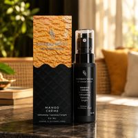 Mango Crème Ice Cream Spray bottle and box together on a console table