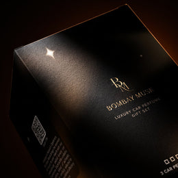 Celestial black and gold packaging detail of the Luxury Car Perfume Gift Set · 2 Perfumes